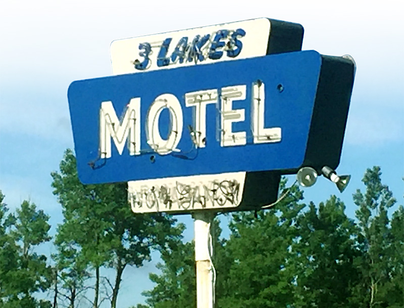 three lakes motel sign in michigame, mi